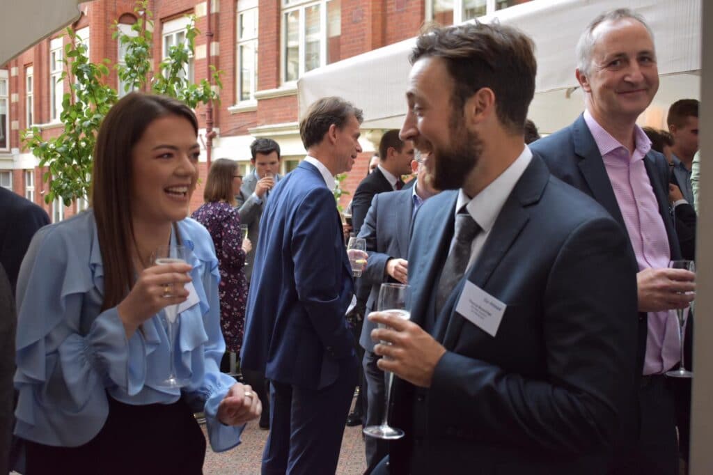 Go-Ahead graduates meet at a party before training starts