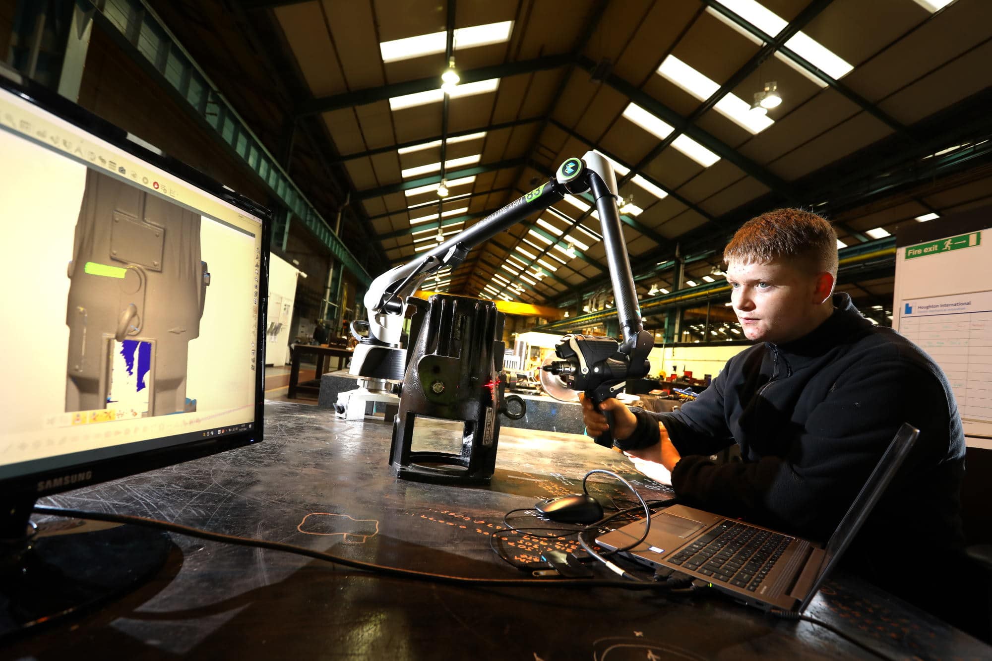 Engineer using a 3D scanner at Houghton International