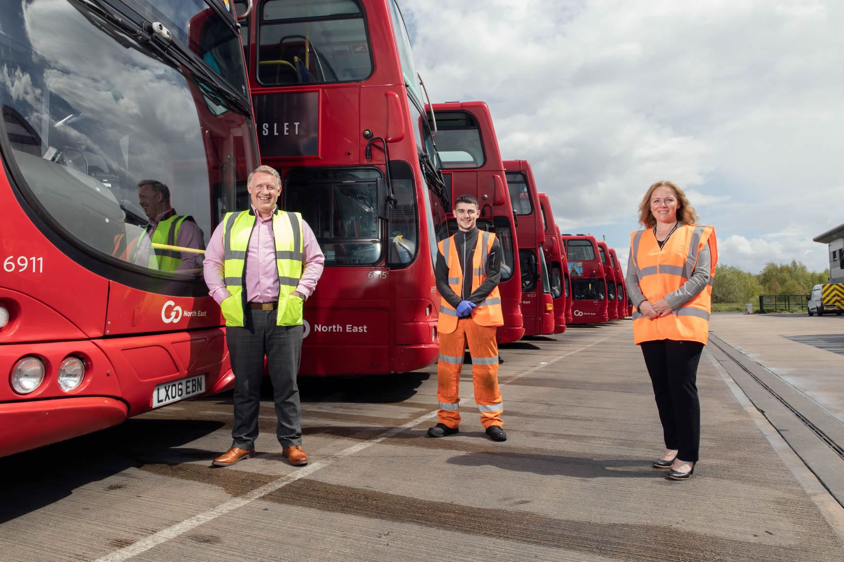 Go North East Engineer director Colin Barnes, apprentice Oliver Barry and Suzanne Slater, Assistant Principal for Apprenticeships at Gateshead College