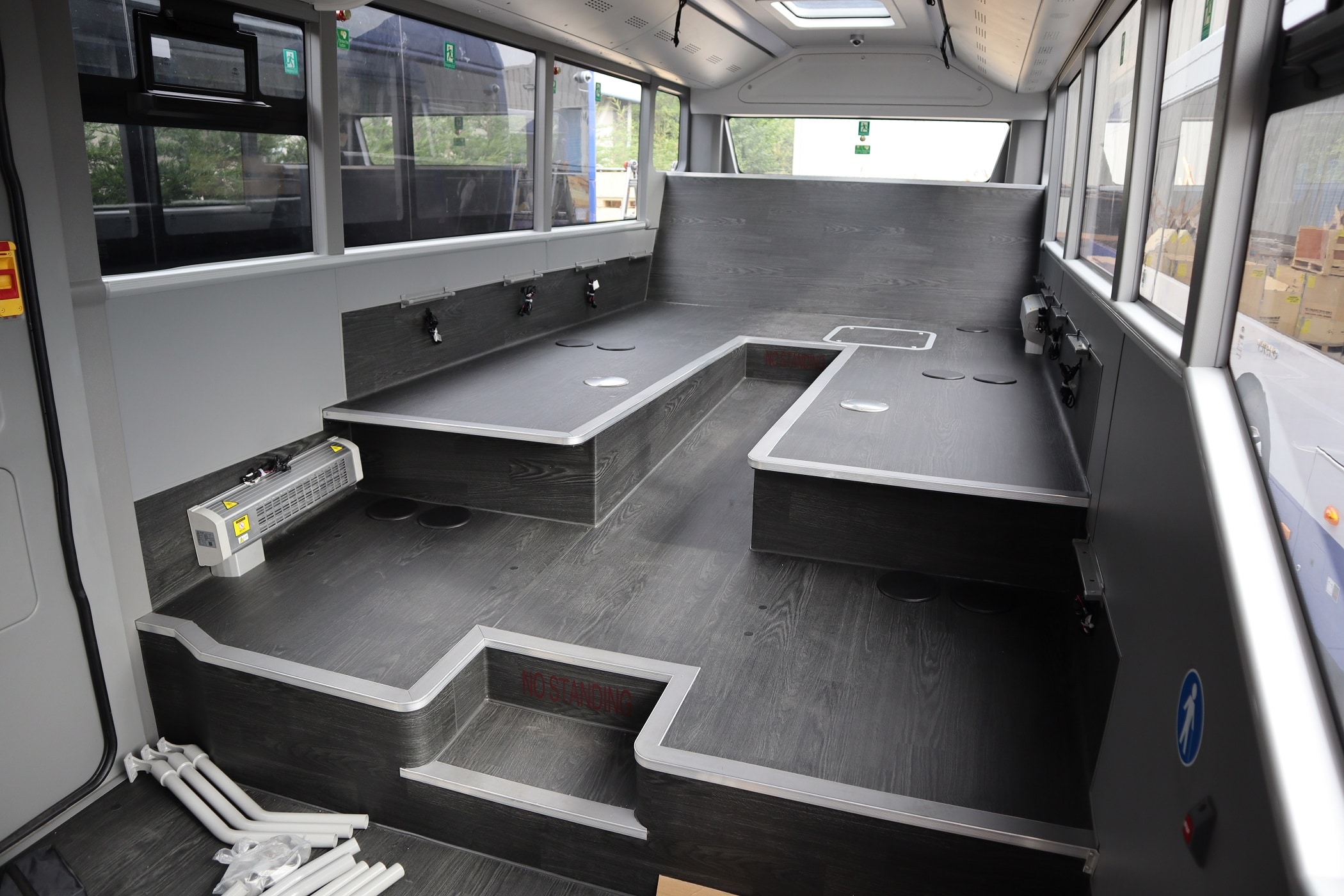 View of interior of a bus after arrival from China