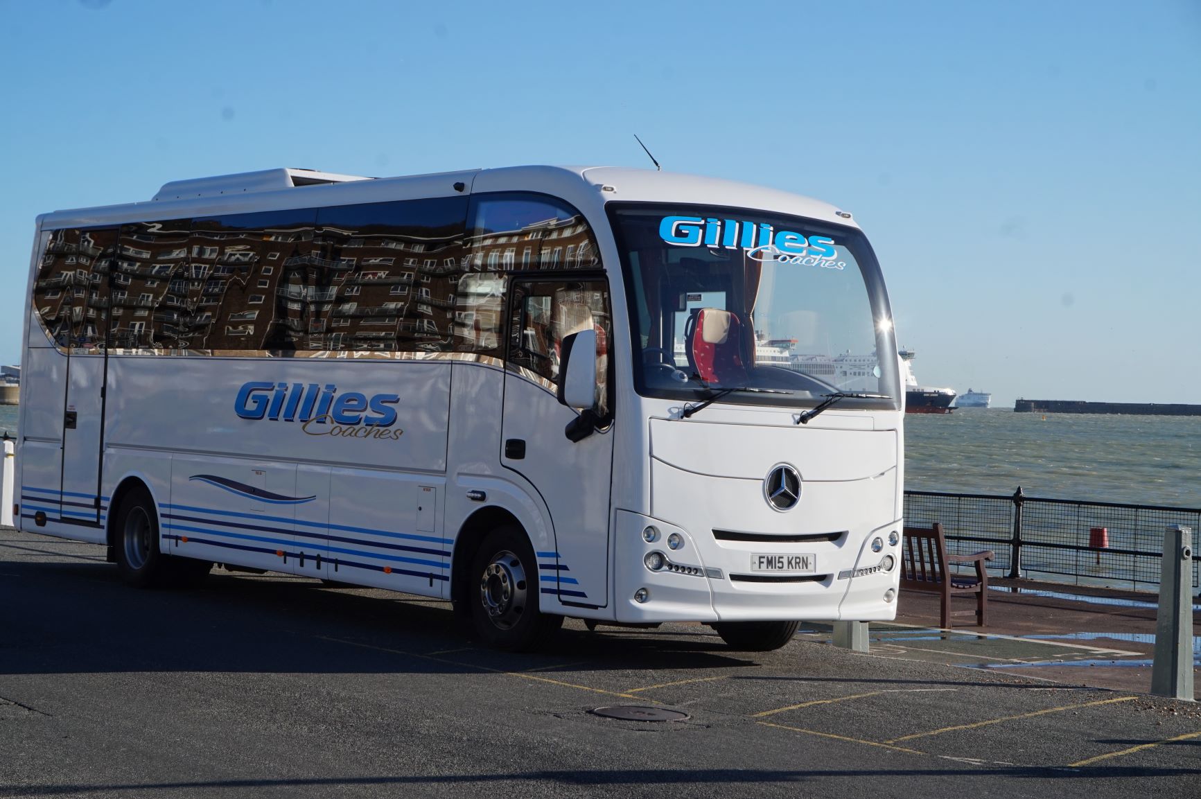 Gillies Coaches coach by the sea