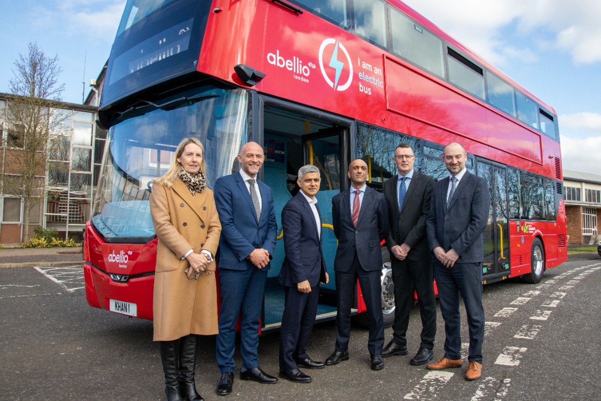 London Mayor Sadiq Khan standing in front of a StreetDeck Electroliner