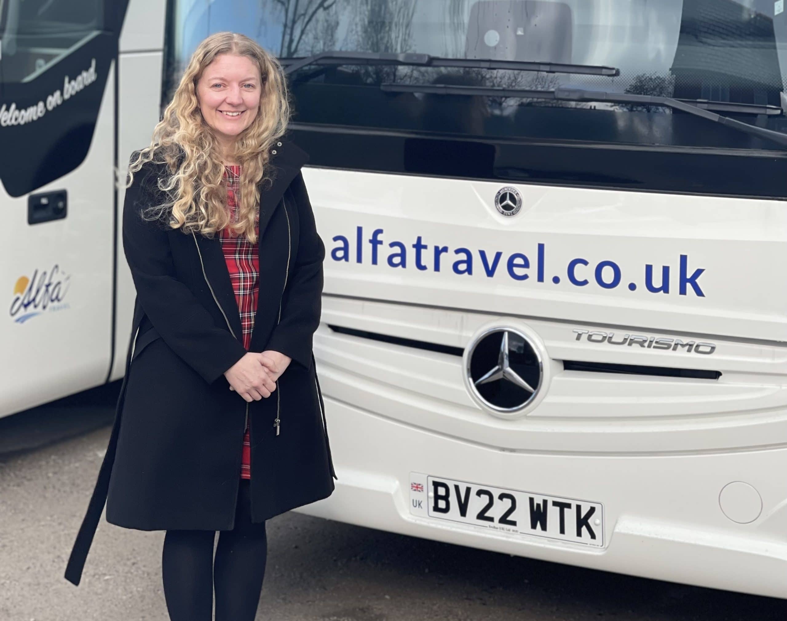 Alfa Travel MD Emma Russell with one of 10 new Tourismo coaches