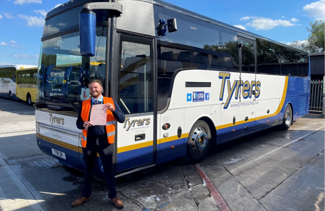 Young coach driver Tom Byrne with Tyrers Coaches