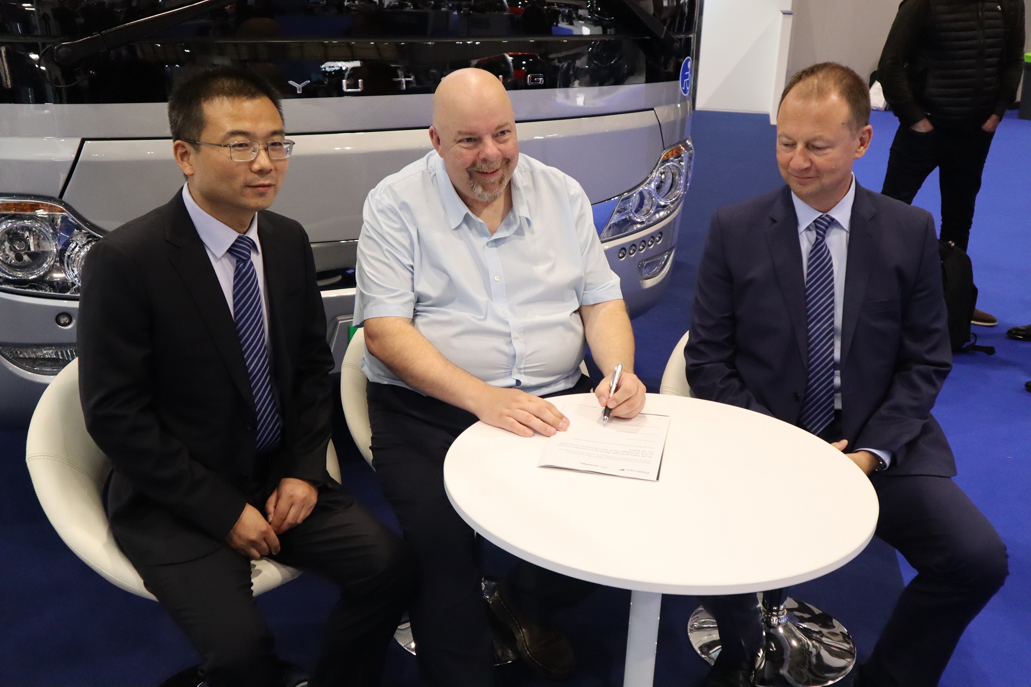 Newport Transport Managing Director Scott Pearson signs contract