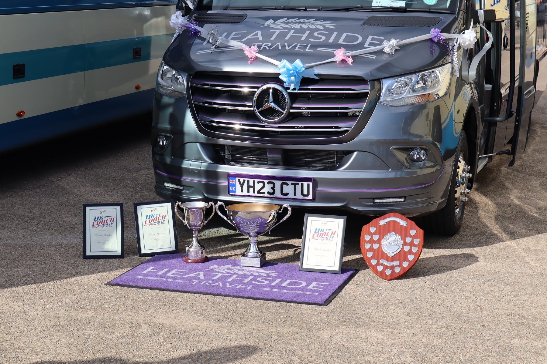 Heathside Travel winners trophy collection at 2023 UK Coach Rally