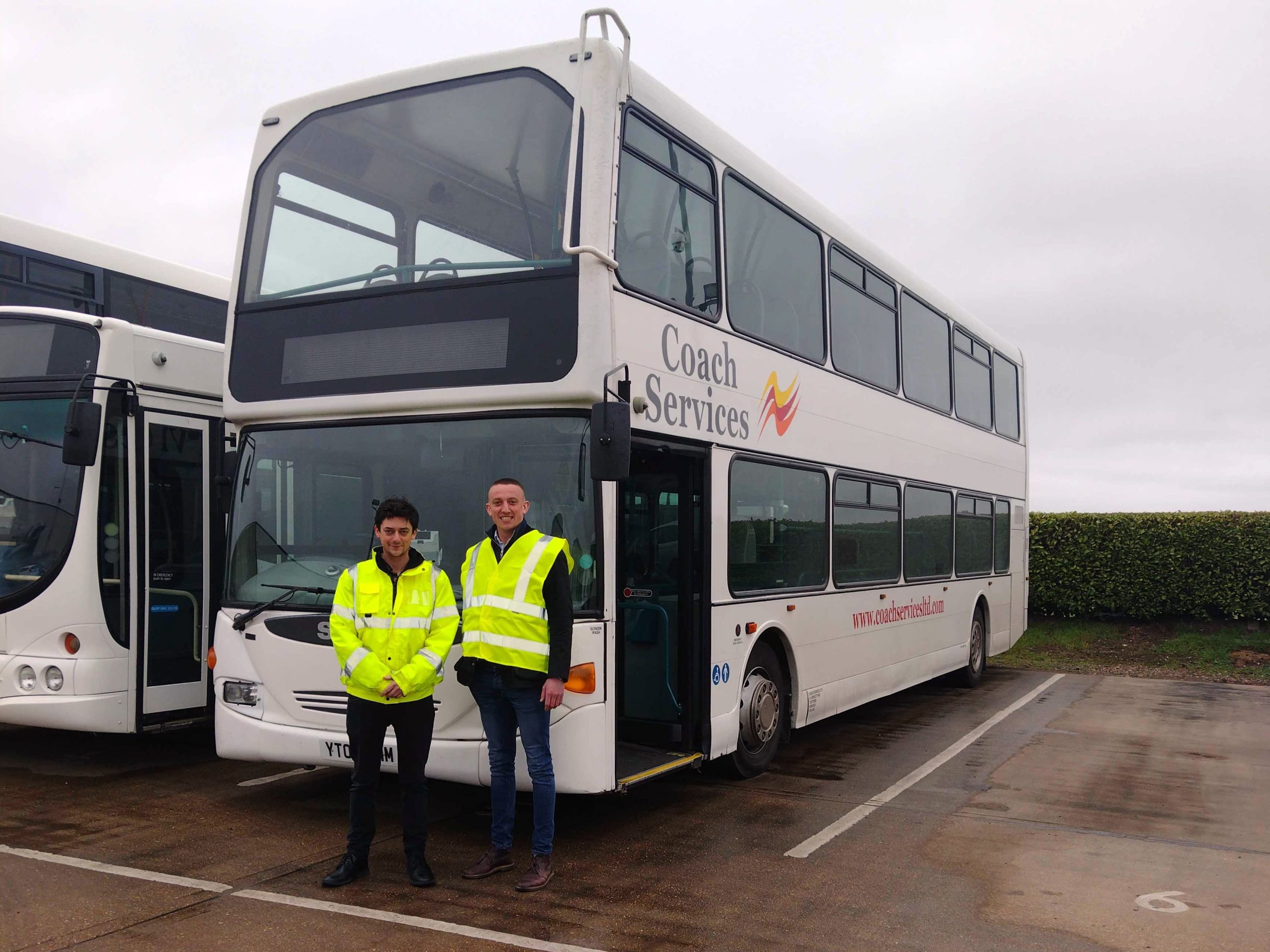 Photo shows Rob Crawford, Financial Director at Coach Services with Chris Desborough, Customer Success Manager at Passenger