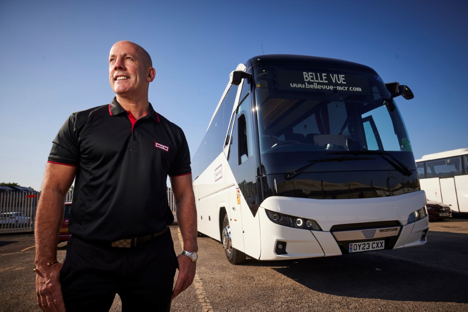 Phil Hitchen with one of Belle Vue Manchester's new Neoplan Tourliner executive coaches1