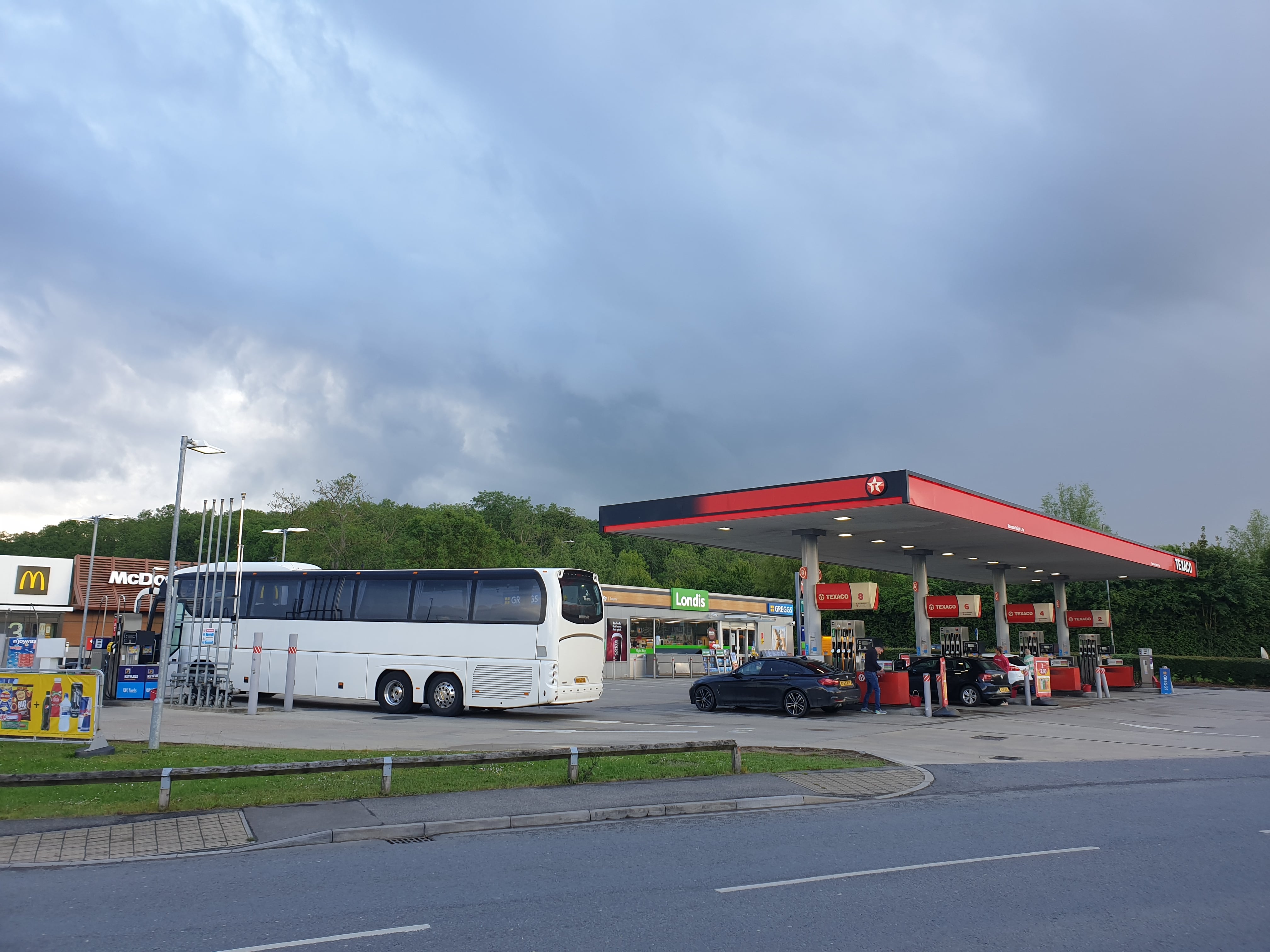 coach at a refuelling station