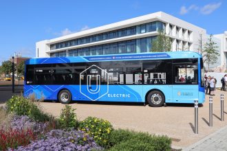 Mellor Sigma 12 bus in Cambridge Universal livery