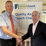 photo of Phil Hitchen of Belle Vue Manchester, right, with Anthony Winson, chairman of the Guild of British Coach Operators