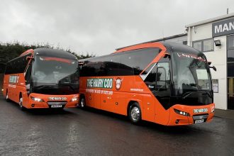 Neoplan Tourliner pair for The Hairy Coo