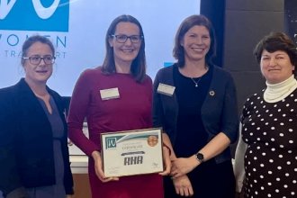 RHA HR Director Laura Taylor receives the Women in Transport Equity Index report