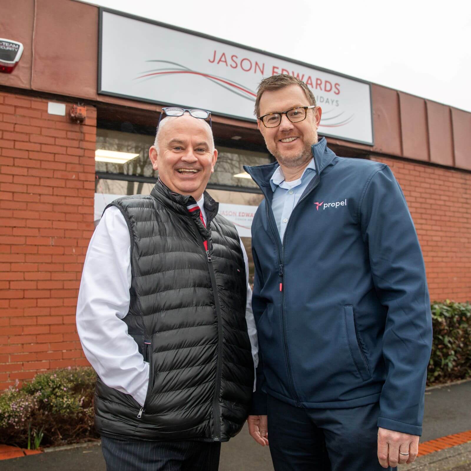 Jason with Mark Mountford of Propel Finance, which financed two coaches for the start-up