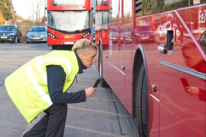 Go-Ahead bus driver using Tranzaura app for vehicle checks (1)