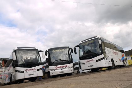 A photo of some Grayscroft coaches