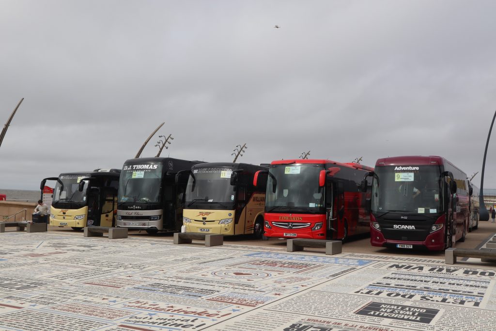 Welsh coach operators parked on the Comedy Carpey