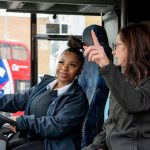 Go-Ahead London bus driver women in bus and coach