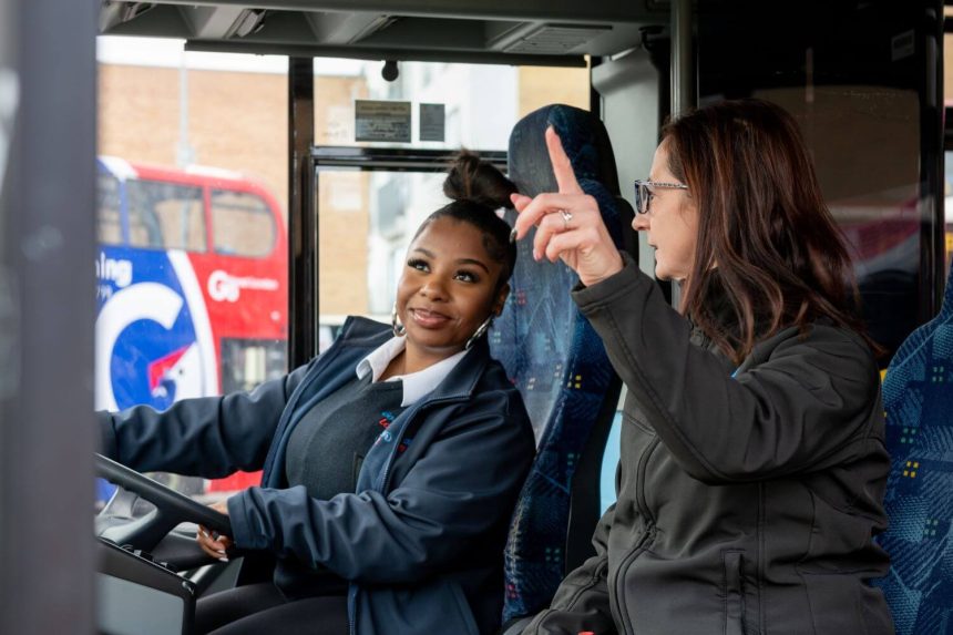 Go-Ahead London bus driver women in bus and coach