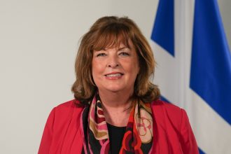 Scottish Cabinet Secretary for Transport Fiona Hyslop address industry ahead of ScotZEB2 winners
