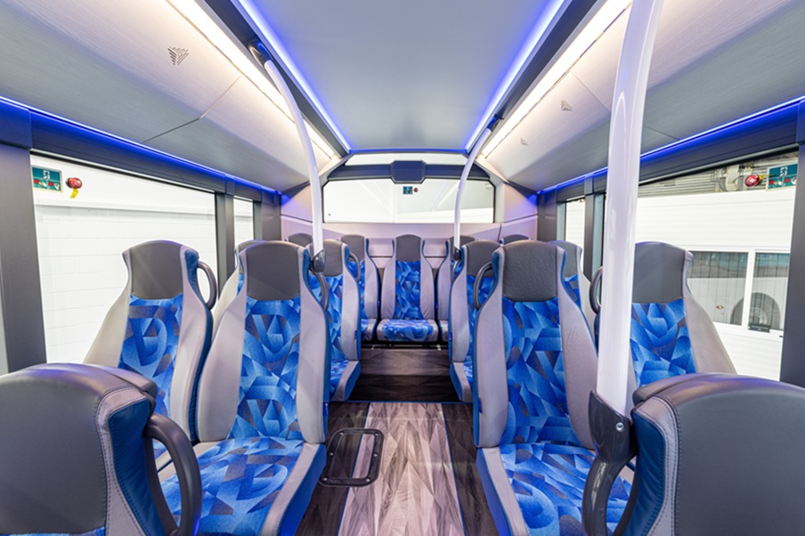 Rear area of passenger saloon with seats and windows visible