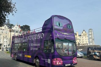Alpine Travel offers 'Alice in Llandudno' open-top bus tour
